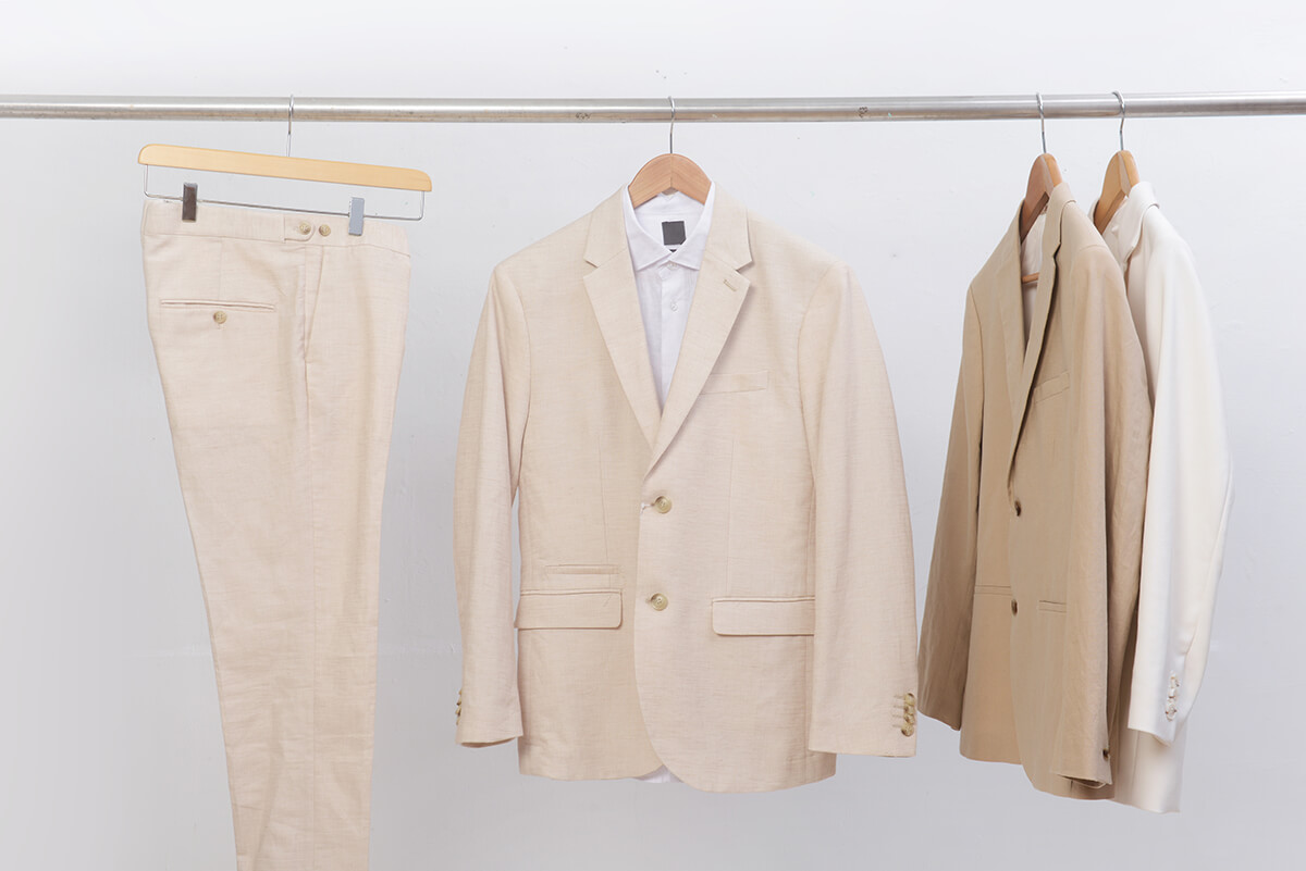 Deciding between a custom-made linen suit and an off-the-rack option boils down to budget, time, and fit preferences